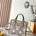 louis-vuitton-onthego-bb-bicolour-monogram-empreinte-leather-handbags–M47054_PM2_Front_view