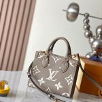 louis-vuitton-onthego-bb-bicolour-monogram-empreinte-leather-handbags–M47054_PM2_Front_view