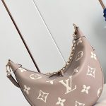 louis-vuitton-loop-hobo-bicolour-monogram-empreinte-leather-handbags–M46738_PM2_Front_view