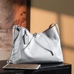 louis-vuitton-carryall-vibe-mm–M12583_PM2_Front view